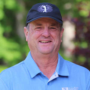Black and white portrait of Robert Linville on the lesson tee